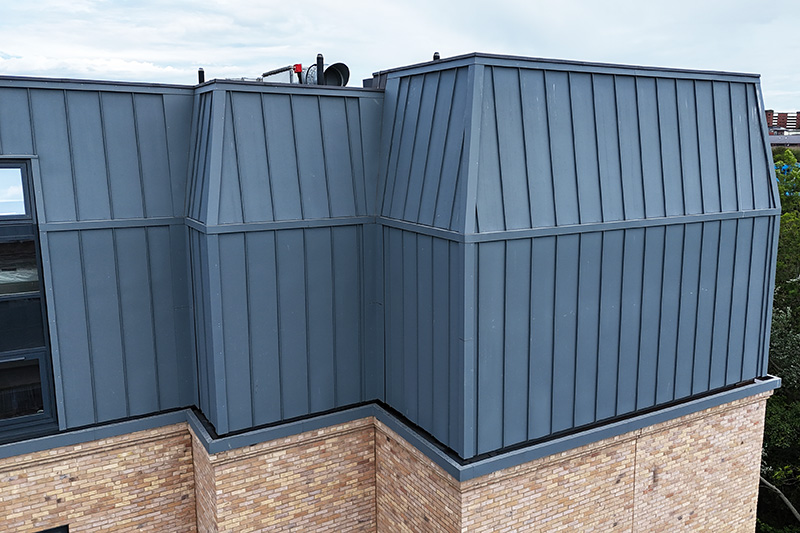 Zinc wall cladding, Vieo standing seam sheets fabricated and fitted on site by KingCraft hard metals, roofing & cladding specialists Leeds, Yorkshire.