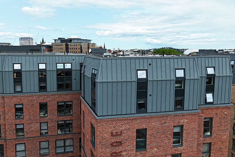 Vieo zinc standing seam wall cladding sheets installed by roofers near me KingCraft roofing & cladding specialists Leeds, Yorkshire.
