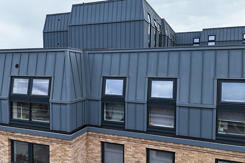 Roofing repairs near me. Vieo zinc cladding standing seam system installed by KingCraft roofing & cladding specialists Leeds, Yorkshire.