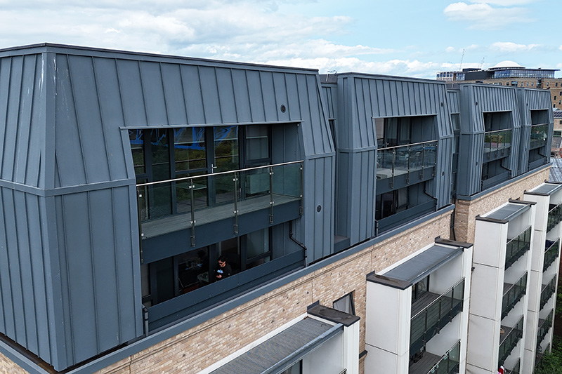 Roofer near me installed Vieo zinc wall cladding, standing seam panels installed by KingCraft roofing & cladding specialists Leeds, Yorkshire.