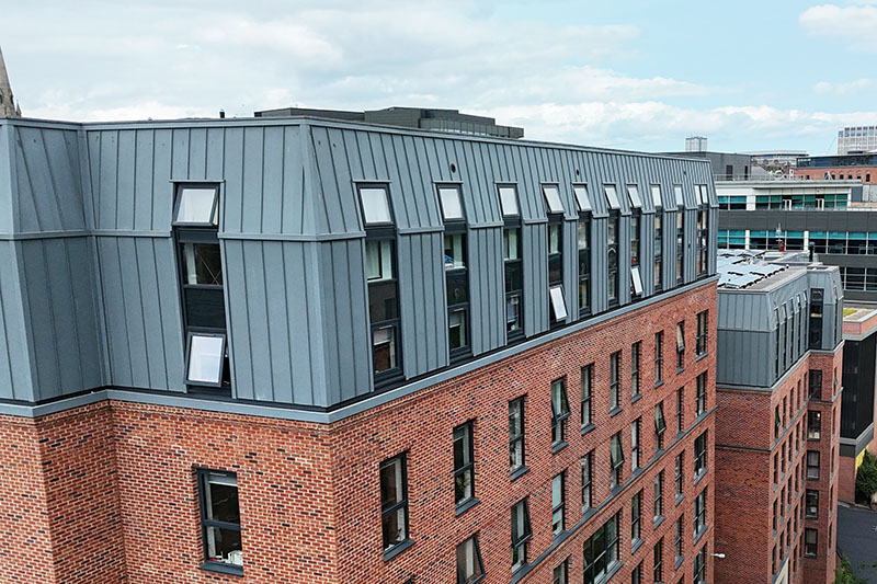 Roofing contractors near me installed zinc wall cladding, standing seam system by KingCraft roofing & cladding specialists Leeds, Yorkshire.
