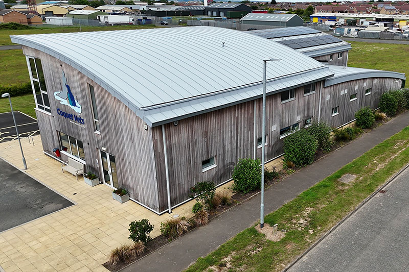 Curved GreenCoat standing seam steel sheets installed by KingCraft hard metals, roofing & cladding specialists Leeds, Yorkshire.