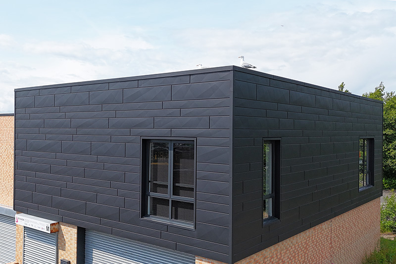 Aluminium wall cladding on commercial building - Roof repairs near me by KingCraft roofing & cladding specialists Leeds, Yorkshire.