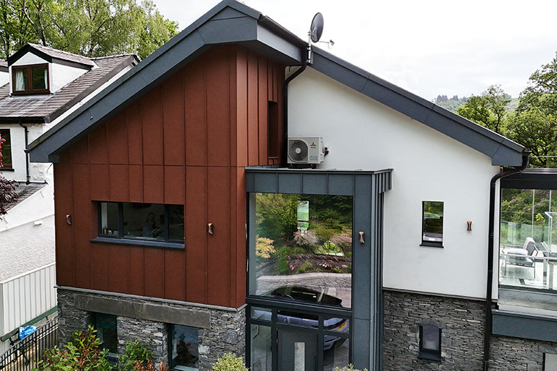 Obróbki z metali szlachetnych - aluminiowa elewacja Prefa na rąbek stojący oraz dach łupkowy wykonane przez KingCraft Dekarstwo i Elewacje, Leeds, Yorkshire.