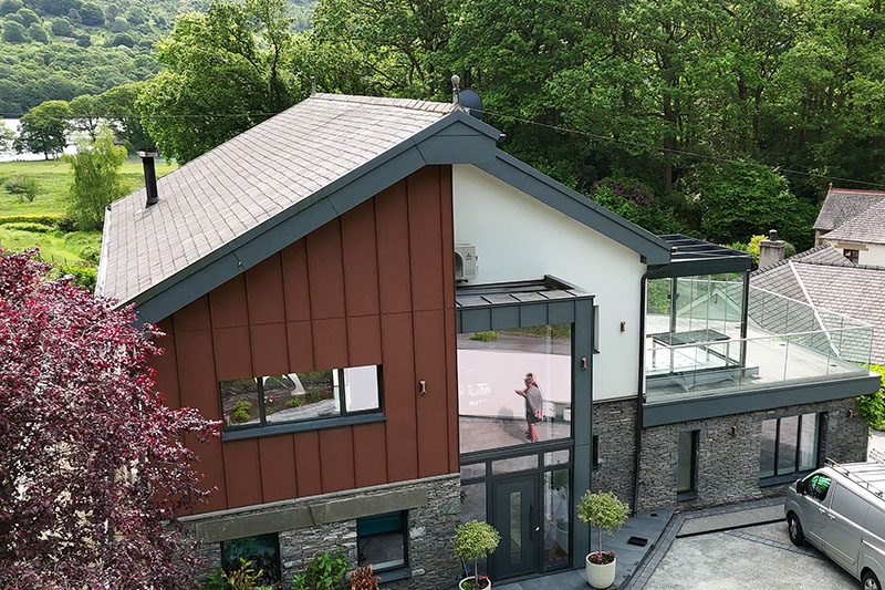 Dormers fitted with standing seam aluminium panels on slate roof by KingCraft Roofing & Cladding in Leeds, Yorkshire.