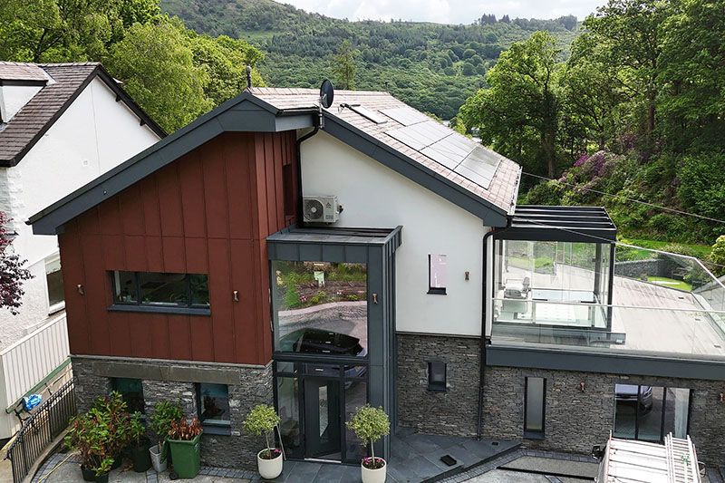 Roofing slates and Prefa aluminium standing seam dormer cladding blended nicely by KingCraft Roofing and Cladding company Leeds, Yorkshire.