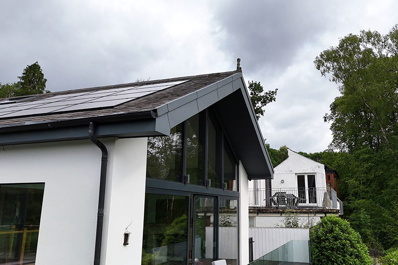 Cold roof slate structure with Prefa aluminium standing seam cladding on dormers by KingCraft Roofing & Cladding, based in Leeds, Yorkshire.