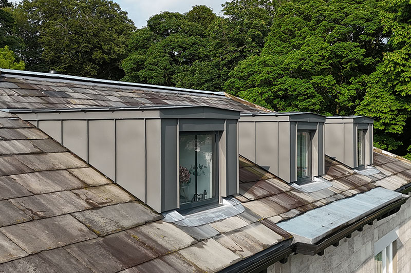 Dormers finished with standing seam zinc and slate roof tiles - KingCraft roofing & cladding team, Leeds, Yorkshire.