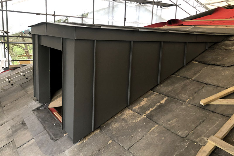 Zinc hard metal wall cladding and slate roofing system installed by KingCraft in Leeds, serving Yorkshire and the Humber.