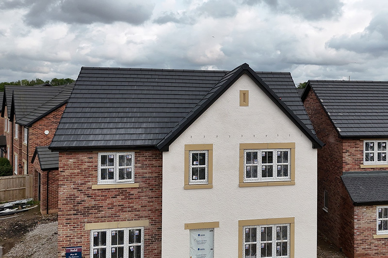 Concrete Redland Roofing tiles installed on pitched roof by roofers from KingCraft - Roofing & Cladding Leeds, Yorkshire and the Humber.